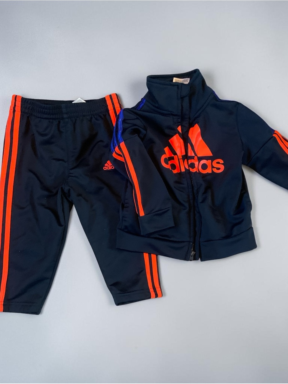 adidas Navy Kids Track Jacket & Joggers with Bright Orange Logo